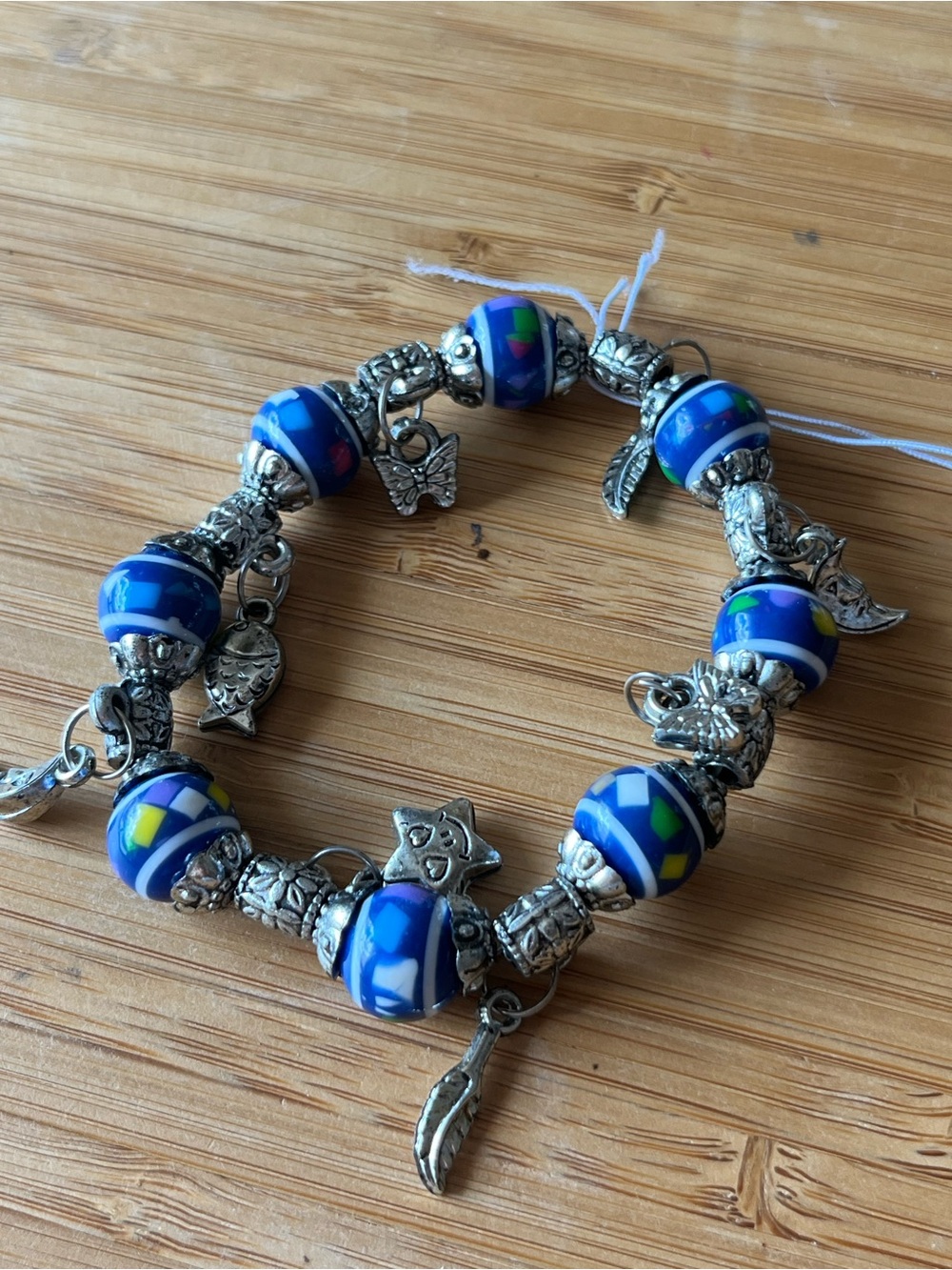 12 Blue And Silver Beads Charm Stretch Bracelet